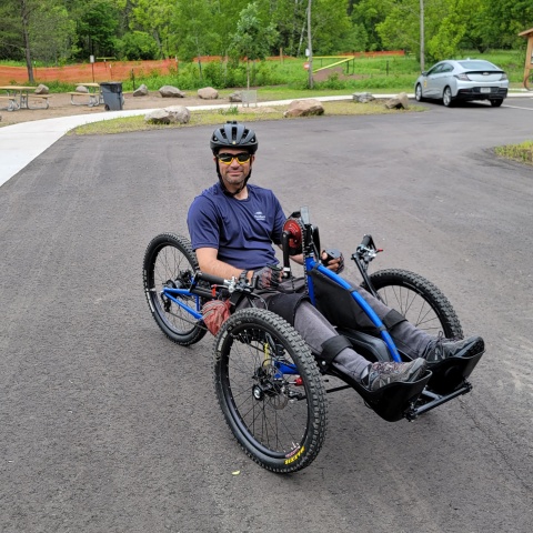 Adaptive hand cyclist at Cuyuna bike trail