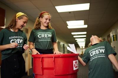 Students having fun recycling at school