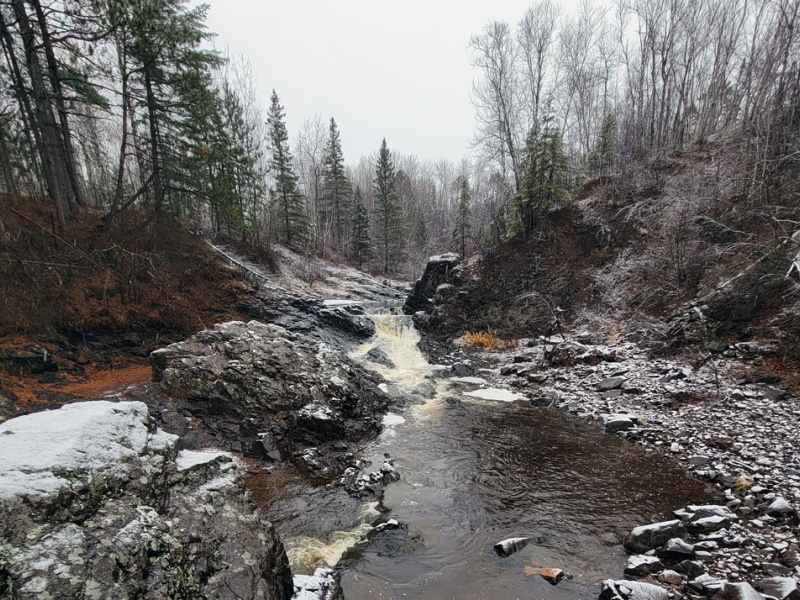 Stream flows through Lester Park in Duluth in winter